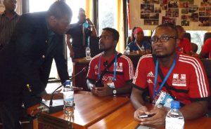 Jacques Martial Henry avec le chef de délégation